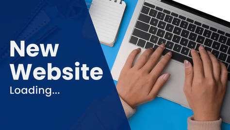 Hands typing on keyboard with text in front that says "New Website Loading..."