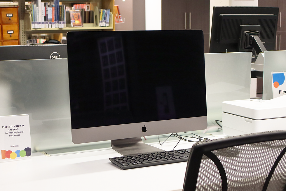 An iMac computer on a desk.