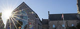 The front of the HHPL Georgetown Branch with the sun shining through on the left.